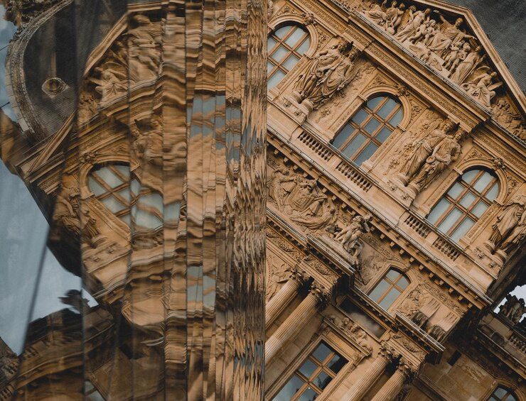 building with large window that says name it 443977 1648