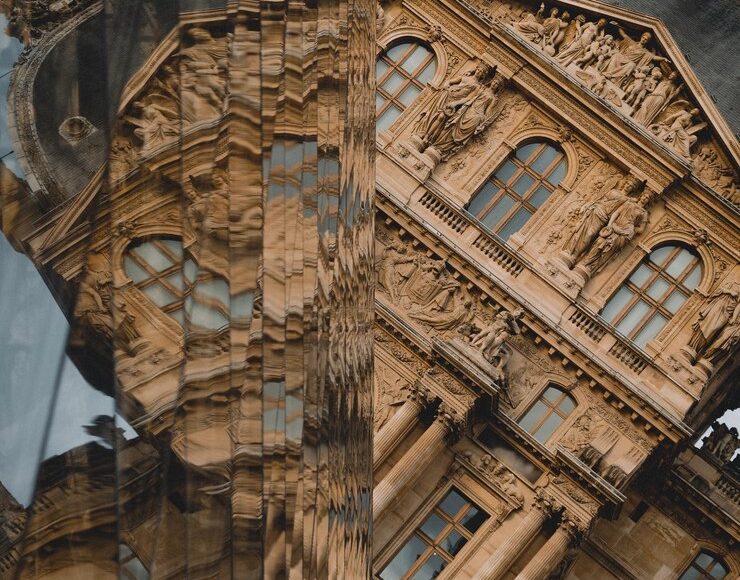 building with large window that says name it 443977 1648