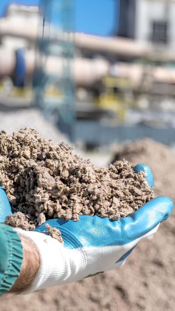 Exclusive Guide to Ivory Coast’s Best Construction Materials 1 person holding shredded paper used as alternative fuel 1 1 1